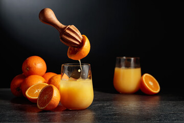 Orange juice is squeezed from fresh fruit.