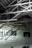 Fototapeta Most - Ventilation System Under Ceiling of Modern Warehouse or Shopping Center. Metal Piping for Air Conditioning