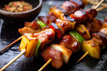 Close-up of yakitori skewers marinated in a sweet and spicy sauce, grilled to perfection and served with a side of steamed rice and pickled ginger, generative ai