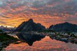 Landscape of Lofoten surrounded by rocky mountains during a beautiful sunset in Norway