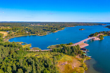 Wall Mural - Panorama view of a bridge on a road between Hammarland and EckerГ¶ at Aland islands in Finland