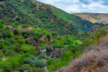 Wall Mural - Barren valley surrounding confluence of Huebra and Camaces rivers in Spain