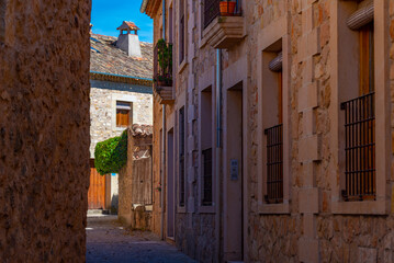 Poster - Narrow street in medieval village Pedraza in Spain