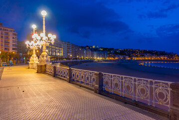 Wall Mural - Night view of seaside promenade at San Sebastian, Spain