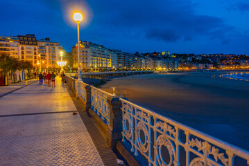 Wall Mural - Night view of seaside promenade at San Sebastian, Spain