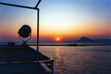 Poster - Sunset over the sea from a ship