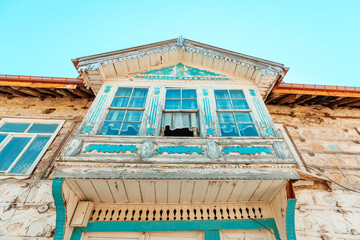 Wall Mural - Ormana's wooden and stone houses showcase the village's traditional architectural style, reflecting the turkish history and culture.