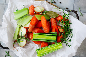 Sticker - Fresh vegetables and herbs for broth on the table