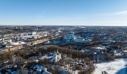 Wall Mural - panoramic view from a drone of the historical part of Smolensk with a fortress wall and churches on a sunny winter day