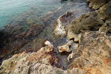 Wall Mural - sea waves crashing against the rocks	