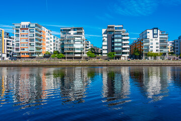 Wall Mural - Residential buildings alongside Nissan river in Swedish town Halmstad
