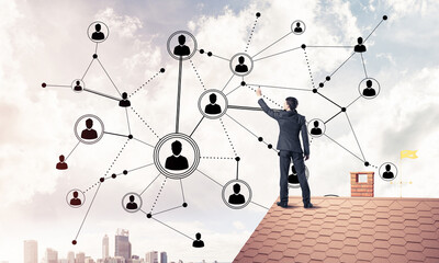 businessman on house roof presenting networking and connection c