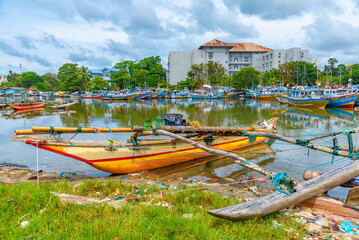 Sticker - traditional catamarans mooring at the shore of Negombo lagoon in Sri Lanka