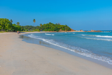 Canvas Print - Sunny day at Uppuveli Beach at Trincomalee, Sri Lanka