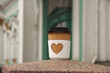 © ksenija1803z - paper cup of natural coffee with carved white heart on on Palace Square in St. Petersburg