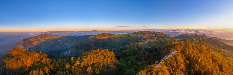 Wall Mural - Sunrise over Sri Lankan highlands viewed from Lipton's Seat viewpoint