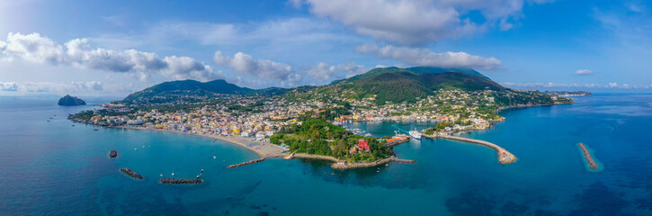 Wall Mural - Aerial view of Porto d'Ischia town at Ischia island, Italy