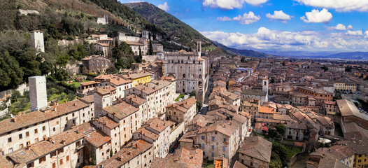 Wall Mural - great historical italian landmarks and best tourist destinations - impressive Gubbio in Umbria. Aerial drone panoramic view of medieval town. Italy travel