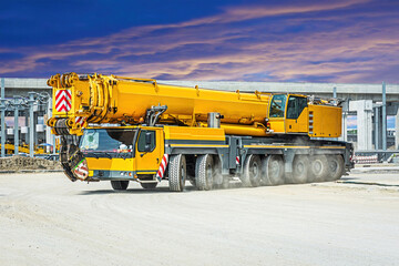 Mobile crane with sky cloudy.