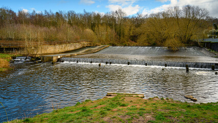 Wall Mural - weir and fish pass at derwenthaugh on river derwent, formed by the meeting of two burns in the north