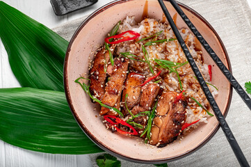 Canvas Print - Roast pork with teriyaki sauce sprinkled with white sesame seeds. Asian cuisine.