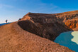 Icelandic landscape of colorful volcanic caldera Askja, Viti crater lake in the middle of volcanic desert in Highlands, with red, turquoise volcano soil and hiking trail, Iceland