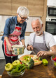 © Budimir Jevtic - Senior couple preparing vegetable soup at home