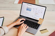 © Seventyfour - Closeup of young woman typing at laptop keyboard and using digital planning system for time-management, copy space