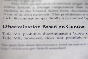 gender discrimination based on gender printed in text on page as visual aid or business law reference