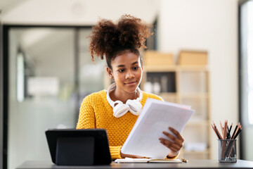 Poster - African american student woman in sweater watching e-learning to