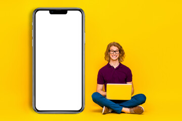 Sticker - Full size portrait of positive nice person sitting floor empty space panel isolated on yellow color background