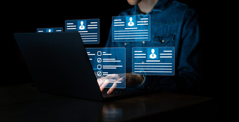 Human resources and management concept. Employees must complete the online survey form answer the test questions. Marked checklist on a clipboard. HR manager checking the employees profiles on laptop