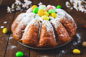 Wall Mural - Easter Cake, Traditional Cake Decorated with Sugar Eggs on Wooden Rustic Background