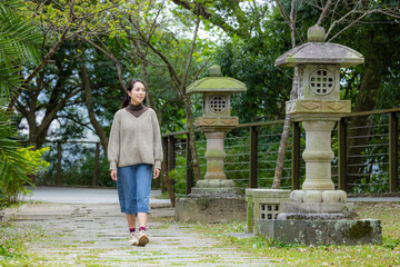 Canvas Print - Woman walk in the Japanese green garden