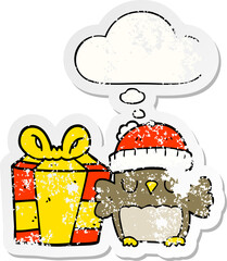 cute christmas owl and thought bubble as a distressed worn sticker