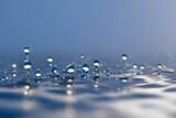 Fototapeta Łazienka -  Ilustracja przedstawiająca wodę, krople wody, pęcherzyki powietrza, tło. Wygenerowane przy użyciu AI.