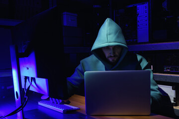 Canvas Print - Hacker working with computers in dark room. Cyber attack