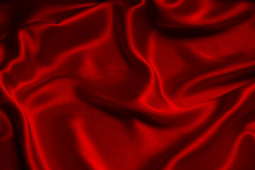 red silk or satin luxury fabric texture can use as abstract background.