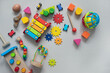 © Michael - top view of bright children's wooden and plastic montessori toys for early development