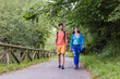 © Sangiao_Photography - Senda del oso, Teverga Asturias. mixed race travelers couple hiking ecotourism conservation path