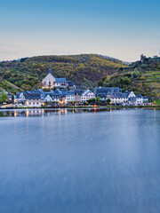 Wall Mural - Vertical long exposure shot of Beilstein village at dusk during autumn  on Moselle river in Cochem-Zell district, Germany