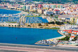 © beataaldridge - View of the Gibraltar airport runaway and Spanish town La Linea de Conception from the Upper Rock. UK