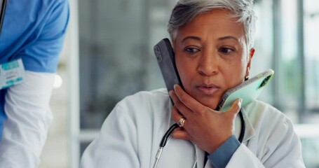 Canvas Print - Elderly doctor, phone and multi tasking overwhelmed by colleagues with paperwork, documents or call at the hospital. Stressed senior medical expert overworked under serious pressure at busy clinic