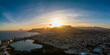 Aerial panoramic drone view of the town of Calpe during the evening.Panoramic view of Calpe, mediterranean sea, and Las Salines lake.