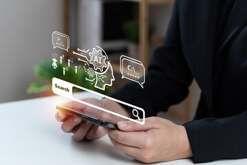 Chatbot with AI (Artificial Intelligence), search engine, businessman using smartphone connecting to AI, use command prompt for generates idea something or solve problems, digital transformation, SEO.