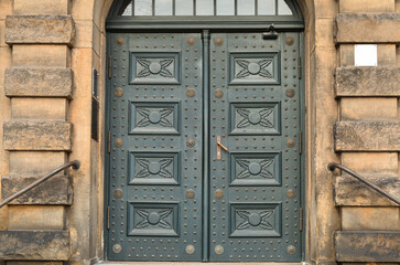 Poster - View of old building with wooden door