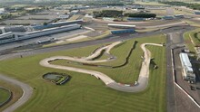 Aerial Flyover View Above Silverstone British Motorsport Racetrack F1 Circuit Turns And Bends