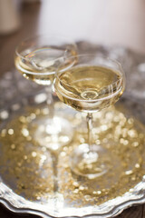 Wall Mural - Glass of champagne with golden stars