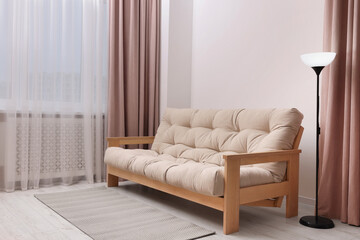 Sticker - Comfortable sofa and lamp in cozy room. Interior design