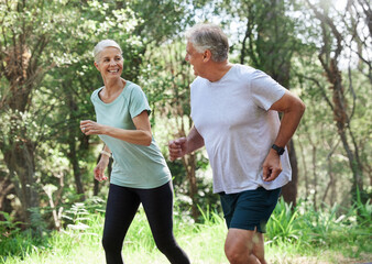 Wall Mural - Senior couple, exercise and happy outdoor for run, workout and training for fitness. Old man and woman in forest for cardio health, motivation and wellness in retirement while running in nature